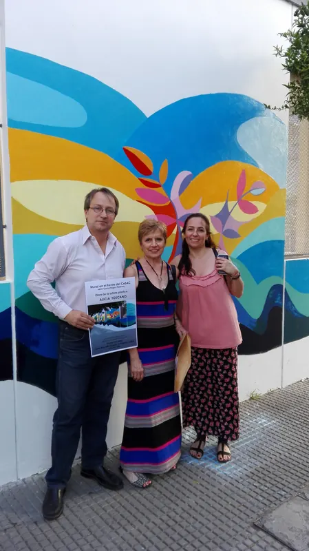 AT con el presidente, de la Comuna 14, Alejandro Pérez,, y una colaboradora